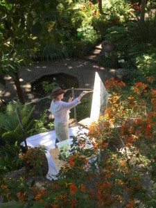 Gianne de Genevraye painting in the gardens